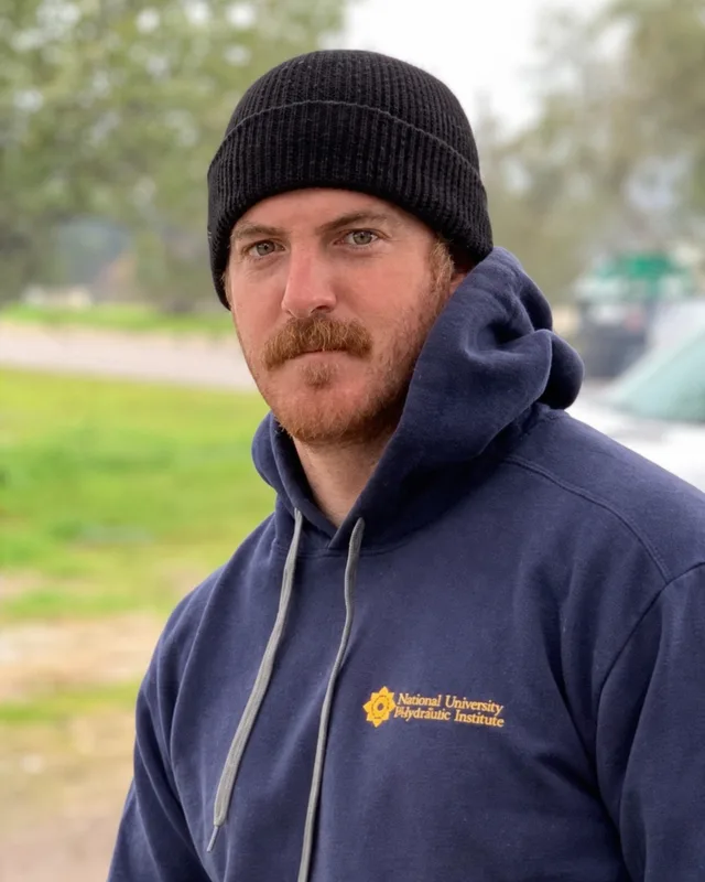 Owner of Upwardbound Building in an outdoor portrait