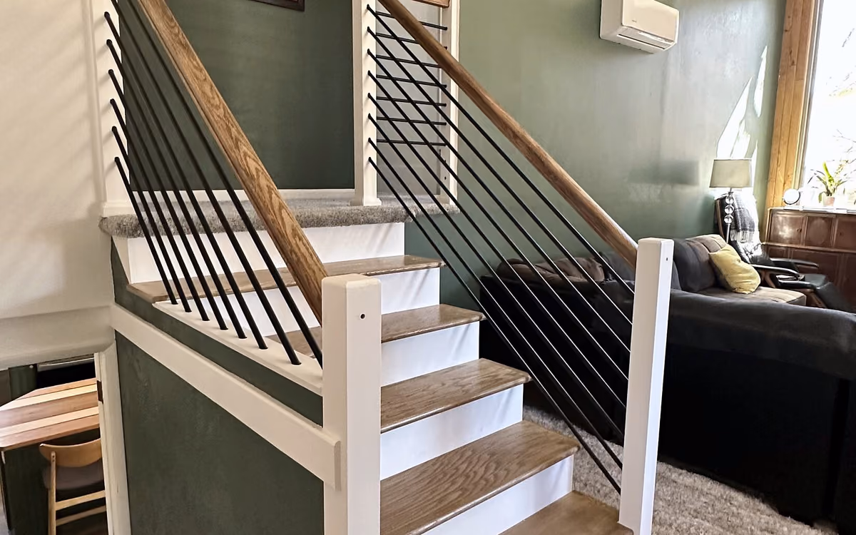 Finished custom stair and railing in the Pleasant Valley whole-home renovation